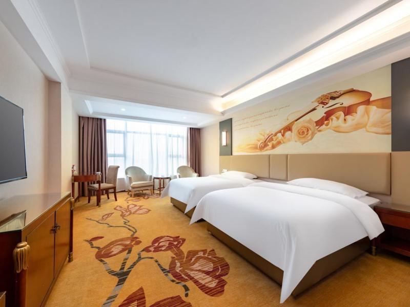 Vienna Hotel Shenzhen Songgang Shajiang Road Buitenkant foto